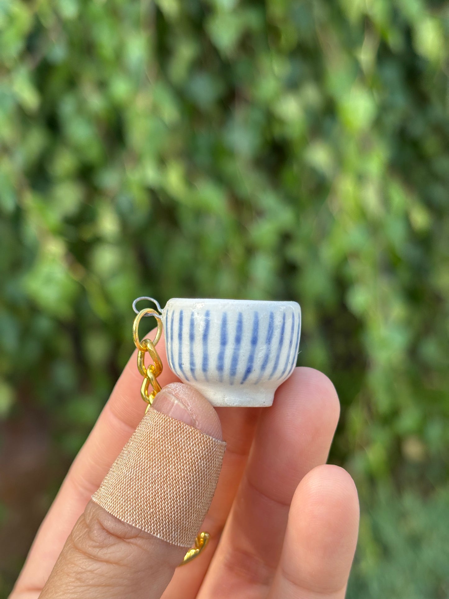Tea Bowl Charm with subtle double blue stripes