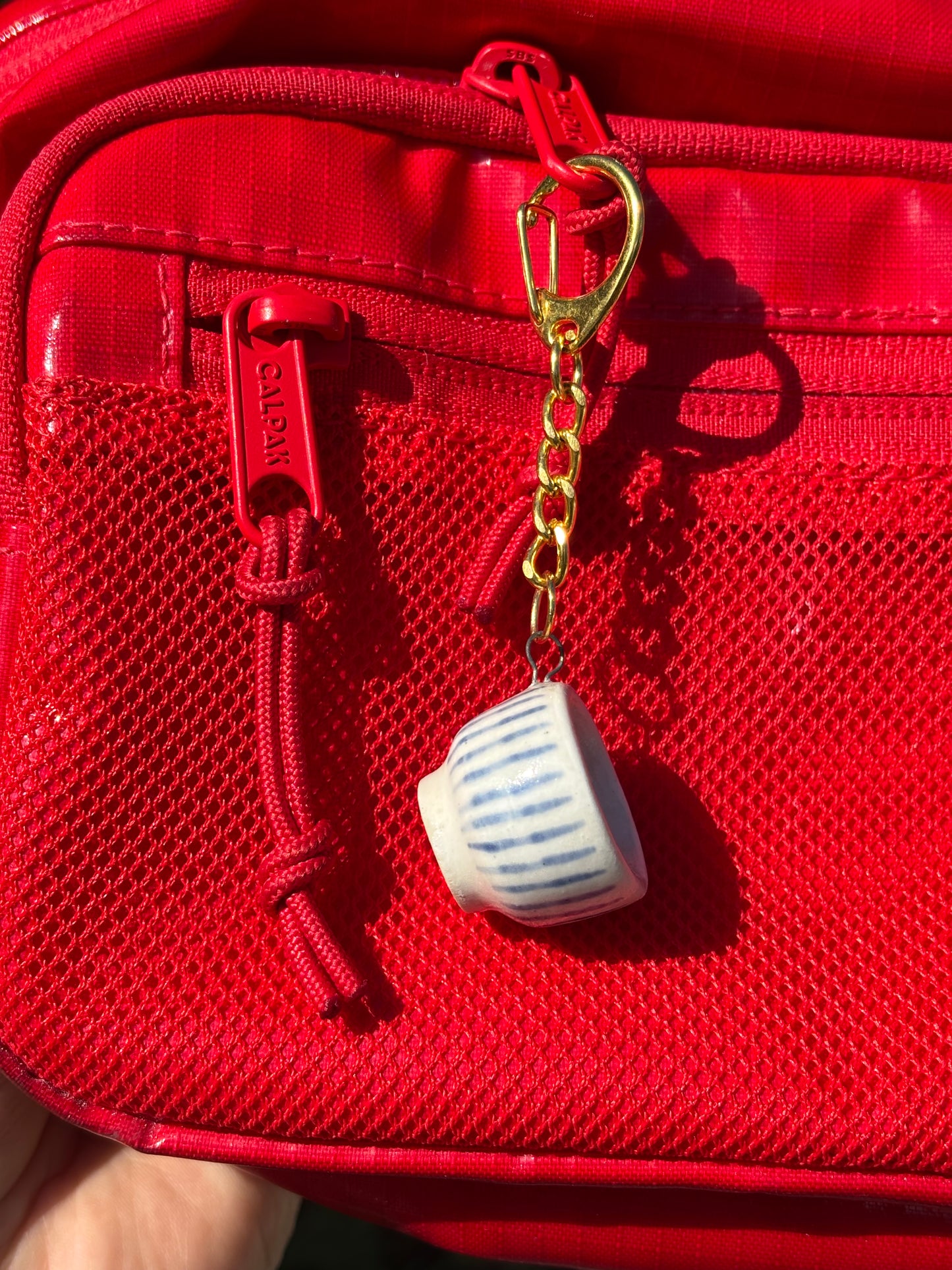 Tea Bowl Charm with subtle double blue stripes